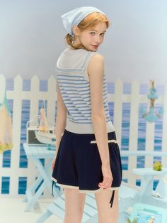 Elevate your kawaii style with this charming sailor collar knitted top in classic blue and white stripes. The sleeveless design makes it perfect for layering or wearing on its own during warmer days. This top is a versatile addition to your wardrobe, pairing effortlessly with skirts, shorts, or jeans to create a cute and playful look.   Please note that this product includes only the knitted top.  Garment Size   	 		 			Size 			S 			M 			L 			XL 		 		 			Full Length 			45 			47 			49 			51 Striped Cotton Sweater Vest For Summer, Preppy Shorts, Steampunk Fashion Male, Gothic Skirts, Kawaii Style, Model Inspo, Sailor Collar, Tokyo Fashion, Knitted Top