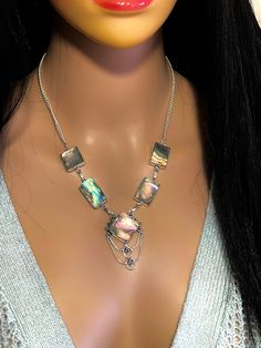 "Beautiful, rainbow of colors, natural abalone shell multi-stone necklace, set in oxidized Sterling Silver plated over copper bezel setting, with open back. Total necklace length is 18\" inches, not adjustable, with spring clasp closure. Total stone weight: 23 grams or 115-carats." Unique Iridescent Gemstone Necklaces, Unique Iridescent Gemstone Necklace, Iridescent Pendant Necklace With Natural Stones, Witchy Whimsical, Abalone Jewelry, Octopus Necklace, Silver Statement Necklace, Whimsical Jewelry, Minimalist Bracelet