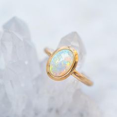 An elongated lozenge shaped white Opal is set into matte yellow gold. Opal measure 10 x 6 mm. Band width 2.2 mm. This ring is able to be made with other gemstones and in other metals. Antique Opal Ring, Marrow Fine, Expensive Things, Opal Solitaire Ring, Dream Future, Opal Ring Gold, Crystal Opal, Instagram Icons, Opal Ring