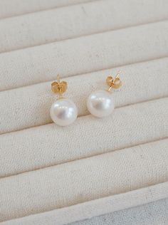 The "Aurora" Akoya Pearl Stud Earrings—You’ve seen pearls before, perhaps you’ve worn them, but not like this. These are quiet, deliberate. The kind of earrings that don’t ask for attention but command it anyway. You slip them on, and suddenly you’re in conversation with something timeless, something lasting. Materials: 18k Gold Vermeil over sterling silver, featuring premium Akoya freshwater pearls. Pearl Size: 8.5-9mm, offering a balanced and elegant statement. Hypoallergenic: Designed to be g Akoya Pearl Drop Earrings Gift, Single Akoya Pearl Earring As Gift, Gift Akoya Pearl Earrings With Ear Wire, White Akoya Pearl Hypoallergenic Earrings, White Hypoallergenic Akoya Pearl Earrings, Akoya Pearl Earrings With Ear Wire For Gifts, Hypoallergenic Akoya Pearl Earrings Gift, Akoya Pearl Earrings With Ear Wire As Gift, Hypoallergenic Akoya Pearl Earrings