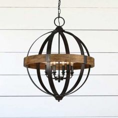 a chandelier made out of wood and metal