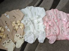 Hand embroidered cardigans UK DELIVERY ONLY  With socks  And hair clip or headband depending on size Avaialble in all colours of embroidery Cardigans are white or slightly off white depending in size Unique designs hand made with love Magical dreams Cream Long Sleeve Baptism Set, Cream Cotton Sets For Baptism, White Embroidered Long Sleeve Sets, Embroidered Cream Sets For Spring, Cute White Sets With Floral Embroidery, Cute White Floral Embroidery Sets, Cute White Floral Embroidered Sets, Pink Long Sleeve Sets For Baptism, Pink Long Sleeve Baptism Sets