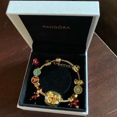 Authentic Pandora 18k Yellow Gold Plated Moments Snake Chain Bracelet With Brand New Iron Man Gold Themed Charms Bracelet Is In Excellent Like New Condition, Authentic Pandora. Retail Bracelet Alone Is $200 Charms Are Non Brand Charms, All Brand New. High Quality Heavy Charms! You’ll Get Everything In Pictures. Very Pretty Bracelet Set. Come With Original Pandora Jewelry Box. Beads For Jewelry Making Pendants Bracelet Pandora Charms Accessories Set For Women Colorful Gems Rose Gold Heart Feather Luxury Charm Bracelet - Perfect Gift, Luxury Charm Bracelet As Gift, Collectible Yellow Gold Bracelets, Luxury Charm Bracelet For Gift, Fine Jewelry Charms Bracelets As Gift, Luxury White Gold Charm Bracelet Gift, Fine Jewelry Bracelets With Charms For Gift, Elegant Yellow Gold Collectible Charm Bracelet, Luxury Charm Bracelet With 17 Jewels For Gift