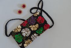 Multi Color(sequence) Floral On Black Beaded Clutch Crossbody Handbag Size: 10x6 inches One Pocket Magnetic Snap Closure Zipper To Open The Clutch Back And Front Fully Beaded And Sequence Work Fabric Silk Beaded Chain Handmade Multicolor Evening Bag For Festivals, Multicolor Handmade Evening Bag For Festivals, Festive Beaded Evening Bag As Gift, Festive Beaded Evening Bag For Gift, Multicolor Pouch Evening Bag For Gift, Multicolor Pouch Evening Bag As Gift, Multicolor Clutch With Handwork, Multicolor Beaded Clutch, Multicolor Clutch For Celebration