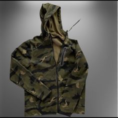 Size Small Old Navy Active Camouflage Jacket. Has Zipped Pouch And Pockets. Never Worn But Has Been Washed. Smoke Free Home Camouflage Hooded Jacket With Adjustable Hood For Streetwear, Urban Camouflage Hooded Jacket For Streetwear, Casual Camouflage Hoodie For Outdoor Activities, Khaki Military Hoodie For Fall, Military Style Khaki Hoodie For Fall, Sporty Camouflage Hoodie For Fall, Military Hooded Outerwear For Sports, Camouflage Hoodie For Fall, Camouflage Military Hooded Long Sleeve Jacket