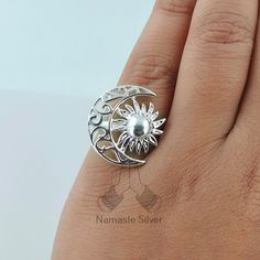 Adorn your fingers with celestial elegance with our 925 Sterling Silver Sun Moon Handmade Ring for Women. This exquisite ring captures the timeless dance between the sun and the moon, creating a symbol of balance, harmony, and everlasting beauty. Meticulously handcrafted with love and precision, this ring is a true work of art that transcends trends, making it a versatile piece for any occasion. Made from high-quality 925 Sterling Silver, the ring features intricate detailing of both the radiant sun and the graceful moon, creating a stunning contrast on your hand. The careful craftsmanship ensures a comfortable fit, making it a joy to wear every day. Whether you're a sun worshipper, a moon enthusiast, or both, this ring allows you to carry the celestial magic with you wherever you go. This Crescent Silver Jewelry With Sun And Moon Design, Spiritual Sterling Silver Rings With Moon Charm, Bohemian Silver Ring With Moon Charm, Sterling Silver Ring With Moon Charm, Bohemian Silver Moon Charm Ring, Spiritual Silver Ring With Moon Charm, Sterling Silver Moon Shaped Celestial Rings, Celestial Silver Ring With Moon Charm, Silver Jewelry With Sun And Moon Design