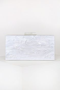 Say ""I Do!"" in style with the Lulus Mrs. Bridal White and Silver Glitter Acrylic Box Clutch! This cute rectangular box clutch has a sleek, opalescent white, acrylic construction accented by a metallic silver glitter graphic that reads ""Mrs."" across the front. Open the matching white clasp closure to reveal a structured, lined interior with accordion sides. Carry as a clutch or attach the matching shiny silver chain shoulder strap! Lined. Clutch measures 8" wide, 4" tall, and 2" deep. Detacha White Rectangular Clutch For Gifts, Rectangular White Clutch As Gift, White Rectangular Clutch As Gift, White Rectangular Case Clutch For Gift, White Rectangular Case Clutch As Gift, White Rectangular Case Clutch For Formal Occasions, White Rectangular Clutch For Formal Occasions, Elegant White Rectangular Clutch, White Rectangular Clutch