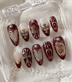 Art Deco Christmas Nails, Claret Nails, Red And Gold Nails Ideas, Gold And Burgundy Nails, Sun And Moon Nail Art, Nails With Gold Charms, Cherub Nails, Burgundy Nails With Gold, Press On Business