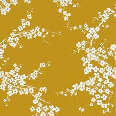 an orange and white wallpaper with small flowers on the top, in front of a yellow background