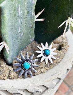 Faux Turquoise Add some western flair to your style with our Spur Earrings! These stud earrings feature tiny spurs (not meant for actual horse riding!) for a quirky and playful touch. Perfect for any cowgirl looking to add a unique accessory to their collection. Nickel-free Western Style Earrings, Nickel-free Adjustable Western Earrings, Adjustable Nickel-free Western Earrings, Western Turquoise Nickel-free Earrings, Turquoise Nickel-free Western Earrings, Western Style Turquoise Nickel-free Earrings, Western Style Nickel-free Turquoise Earrings, Adjustable Turquoise Concho Earrings, Cowgirl Look