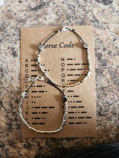 These beautiful morse code bracelets are completely customizable! They come in silver morse code or gold morse code. I can put any word or couple of words on these. They come with a decoder and have the message written on the back. I have a variety of colored hearts you can add to bracelet. They are made to order and are the perfect gift for literally any holiday, birthday or event! Morse Code Bracelets, Code Bracelets, Code Morse, Morse Code Bracelet, Morse Code, Holiday Birthday, Jewelry Bracelets, Beaded Bracelets, Perfect Gift