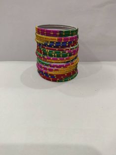 Welcome to our shop We bring to you very ethnic products from core of India almost every thing is handmade or custom made Set of 22 Bangles in multiple colors Size 2.4 We will be happy to serve you Handmade Pink Bracelets For Festive Occasions, Handmade Pink Bracelets For Festive Season, Festive Handmade Yellow Bracelets, Handmade Pink Festive Bracelets, Handmade Pink Bangle For Festive Occasions, Pink Handmade Traditional Bangle, Festive Handmade Pink Bangle, Traditional Colorful Handmade Bracelets, Handmade Green Bangle For Festival