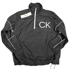 Brand New With Tags Measurements Shown In Photos Long Sleeve 100% Polyester Chest Ck Logo Black With White Accent Feel Free To Ask Any Questions Calvin Klein Mens S Windbreaker Pullover 1/4 Zip Logo Ck Spring Classic. Black Half-zip Top With Pockets, Sporty Calvin Klein Tops For Sports, Calvin Klein Sporty Long Sleeve Outerwear, Calvin Klein Jacket, Ck Logo, Navy Blue Jacket, Water Resistant Jacket, Black Windbreaker, Beige Jacket