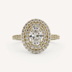 a yellow gold and white diamond ring with two rows of diamonds on the band, set in