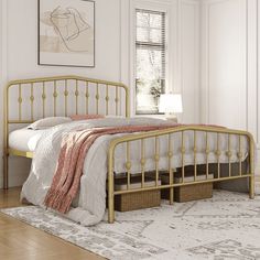 a bedroom with a bed, rug and window in the corner that has white walls