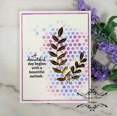 a close up of a card with flowers