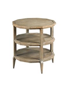 a round wooden table with three shelves on each side