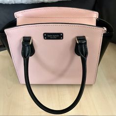 Guaranteed: Authentic. Brand New. Pristine. As Advertised. Bnwt Kate Spade Bag Designer Handbag With Adjustable Strap + Handles. Sold Out Retail $329 Selling For $100 Off Retail Versatile Called A “Satchel” But The The Handles And Long Strap It Can Be Used As A Handbag Or Crossbody Bag Too! Color Is A Soft Tone That Appears From Light Rose To Tan To Peach To Very Light Blush Pink Depending On Light. Leather. Contrast Stitching With Striking Black Accents. Satin Lining With Sparkly Kate Spade Log Light Blush Pink, Kate Spade Logo, Spade Logo, Light Rose, Designer Handbag, Rose Lights, Walker Boots, Black Accents, Fit N Flare Dress