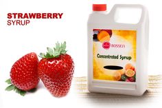 a bottle of liquid next to two strawberries on a white background with the words, strawberry syrup