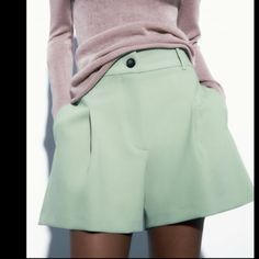 High-Waisted Shorts With Belt Loops Waistband. Side Hidden In-Seam Pockets And Back Welt Pockets. Front Pleat Detail. Front Zip And Button Closure. Chic Wide Leg Shorts With Belt Loops, Green Wide Leg Shorts With Pockets, Trendy Workwear Pants With Built-in Shorts, Green Wide-leg Shorts With Pockets, Zara Bottoms With Built-in Shorts, Chic High Waist Solid Color Shorts, Chic Solid Color High Waist Shorts, Green Workwear Shorts With Belt Loops, High-waist Shorts With Built-in Liner For Work