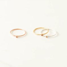 Color meets minimalism in our new birthstone rings. Wear them alone, stacked with other styles, or alongside your loved ones' birthstones. Modern Open Ring Birthstone Ring, Minimalist Gift Birthstone Ring With Bezel Setting, Minimalist Birthstone Ring With Bezel Setting For Gift, Minimalist Birthstone Ring With Bezel Setting As A Gift, Modern 14k Gold Birthstone Ring, Minimalist Open Ring For May Birthstone, Everyday Stackable Open Rings With Birthstone, Minimalist May Birthstone Open Ring, Minimalist Stackable Rings For Gifts