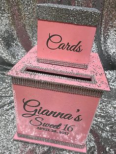 two pink boxes with silver glitter on them and the words grandma's sweet 16