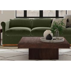 a living room scene with focus on the couch and coffee table