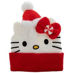 a hello kitty hat with a candy cane on it