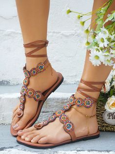 Type : Thong Sandals Introducing our Fashionable Vacation Style Strappy Brown Flat Sandals for Women. With chic faux pearl accents and a comfortable flat design, these sandals are perfect for spring, autumn, and summer. Elevate your fashion game while staying comfortable all day long. Color : Brown Style : Vacation Pattern Type : Tribal Toe : Toe Post Details : Beaded Upper Material : PU Leather Lining Material : Polyester Insole Material : PU Leather Outsole Material : Rubber Brown Flat Sandals, Flat Sandals For Women, Trending Sandals, Boot Print, Brown Flats, Stylish Sandals, Canvas Shoes Women, Comfortable Flats, Vacation Style