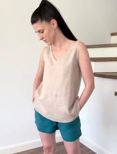 "Natural eco-friendly loose washed linen tank top for women's. Made with love for You. *100% local medium weight linen *Breathable tissue *Each item is individually cut and sewn by order *The model is wearing size M, top color - beige *The model is height is 168 cm *The length from shoulder to hem 65 cm *Note that colors may look different on your display depending on their settings and technical characteristics. Please let us know if you need different measurements or colors. CARE: *Machine was Everyday Sleeveless Linen Tank Top, Everyday Linen Sleeveless Tank Top, Beige Linen Tank Top For Beach, Casual Sleeveless Flax Tank Top, Sleeveless Linen Top For Everyday, Everyday Sleeveless Linen Top, Relaxed Sleeveless Tank Top For Spring, Beige Sleeveless Linen Top, Relaxed Sleeveless Summer Top