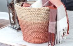 a basket with a blanket on top of it