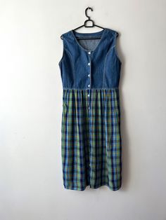 Vintage Plaid denim blend viscose dress Checkered shirt dress Button down Dress Medium size retro dress Sleeveless dress Everyday Summer Dress Estimated size: M Measurements: (lying flat) Shoulder: 15"/  Pit to pit: 19.5"/ 49.5 cm Waist: 17"/ 43.3 cm Length total: 46"/ 117 cm38 cm Please check measurements to insure a proper fit. Remember to allow yourself some extra room for movement. You can compare these with something from your closet that fits you well. This dress will come to you freshly l Dress Everyday, Viscose Dress, Checkered Shirt, Vintage Plaid, Extra Room, Button Down Dress, Dress Medium, Button Dress, Everyday Dresses