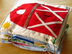 a red and white bag sitting on top of a wooden table