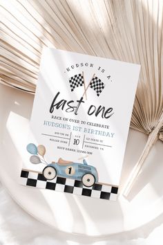 a birthday party with a race car theme on the front and back of the card