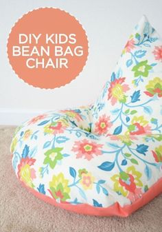 this bean bag chair is made from fabric and has flowers on it, with the words diy kids bean bag chair