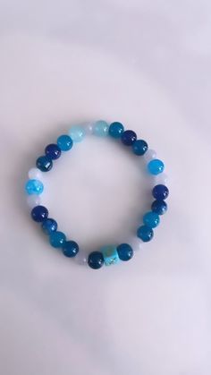 The Sagittarius bracelet features a beautiful blend of blue hues, accented by marble beads. This measures to 17 cm. To determine your bracelet size, wrap a measuring tape around your wrist. Sagittarius Bracelet, Measuring Tape, Blue Hues, Bracelet Sizes, Jewelry Bracelets, Marble, Beaded Bracelets, Bracelet, Beads