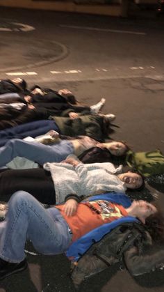 there are many people laying on the street