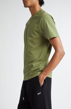 Soft, breathable cotton makes an easy go-to of a T-shirt that's styled in mossy green and embroidered with a tiny logo on the center of the chest. Crewneck Short sleeves 100% cotton Hand wash, dry flat Made in Portugal Designer Clothing Black Owned/Founded Green Sporty T-shirt With Relaxed Fit, Green Athleisure Tops For Everyday, Green Relaxed Fit Sporty T-shirt, Sporty Green T-shirt Relaxed Fit, Green Classic Relaxed Fit T-shirt, Classic Green Relaxed Fit T-shirt, Green Cotton Crew Neck T-shirt, Solid Cotton Athleisure T-shirt, Solid Color Cotton T-shirt For Athleisure