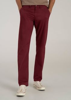 About Our Tall Chinos Stylish, comfortable and built for your frame. These men's tall pants will become your new go-to pair for any occasion. As a tall guy, you're used to having limited options when it comes to chinos, with inseams that are too short and styles that fit in all the wrong places. Chinos are meant to provide a polished look but as a tall guy, you're often stuck with a look that's more awkward than put-together. We're changing the game when it comes to pants for tall men. These chi Classic Red Bottoms For Business Casual, Classic Red Bottoms With Welt Pockets, Classic Red Straight Leg Bottoms, Red Classic Straight Leg Bottoms, Casual Burgundy Straight Leg Bottoms, Red Tapered Leg Cotton Chinos, Red Cotton Tapered Leg Chinos, Red Straight Leg Pants With Welt Pockets, Casual Red Straight Leg Chinos