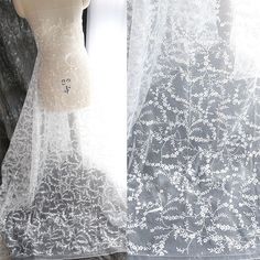 Beautiful white color sparkle tulle with Glitter This is a new style in high quality. Great for wedding dress, evening gown, Costume, cocktail dress, flower girl dress Color: white Width - 53 inches, Length - by yard Wholesale acceptable, please convo me Shipping Time: United Sates: 10-15 working days United Kingdom:10-15 working days Canada: 10-15working days Australia: 10-15 working days Asia:4-8 working days Europe: 10-20 working days need express mail service , please contact us Spring Wedding Lace Dress With Sequins, Spring White Tulle Wedding Dress, White Scalloped Lace Dress For Prom, White Lace Dress For Bridal Shower, White Net Dress For Party, Elegant White Sequin Tulle Fabric, White Lace Trim Prom Dress, White Tulle Lace Party Dress, Lace Tulle Fabric With Sequins For Wedding