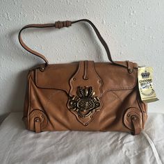 Juicy Couture Brown Leather Brass Buckle Handbag ~ Nwt We Entertain All Reasonable Offers So Let’s Make A Deal! -Fashion Sky Designer Shoulder Bag With Brass Hardware, Designer Beige Shoulder Bag With Brass Hardware, Designer Clutch With Metal Hardware, Designer Crossbody Shoulder Bag With Brass Hardware, Designer Clutch Shoulder Bag With Metal Hardware, Designer Beige Bags With Brass Hardware, Luxury Beige Shoulder Bag With Brass Hardware, Designer Leather Satchel Clutch, Leather Clutch Shoulder Bag With Branded Hardware