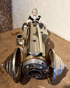 a toy motorcycle made out of metal parts