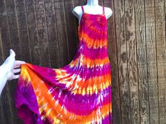 "Vintage tie dye dress. No tags - estimated size large. Please see measurements. Condition - has small seam separation in front near bottom - see last photo.  Measurements taken across front laid flat 19\" across front armpit to armpit 18\" across waist 26\" across hips 57\" total length" Flowy Tie-dye Hand Dyed Maxi Dress, Flowy Hand Dyed Tie Dye Maxi Dress, Hand Dyed Maxi Dress For Spring Vacation, Casual Hand-dyed Summer Maxi Dress, Spring Tie Dye Maxi Dress With Batik Print, Spring Tie Dye Batik Print Maxi Dress, Flowy Tie-dye Batik Print Dress, Casual Hand Dyed Festival Maxi Dress, Casual Hand Dyed Maxi Dress For Festivals