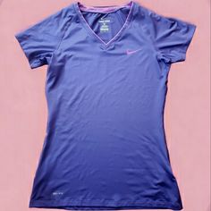 Fitted Short Sleeve Style. This Is Brighter Purple And Pink Accented Colored Top. Pictures Es Give It A Blue Look Not Blue!! Perfect Shirt For Staying Active! Nike Sporty Purple Top, Purple Crew Neck Workout Top, Nike Purple Tops For Sports, Purple Nike Sporty Top, Fitted Nike Purple Tops, Nike Sports Tops In Purple, Purple Short Sleeve Top For Workout, Purple Crew Neck Sports Top, Nike Purple Fitted Top