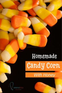 homemade candy corn with honey on a black background and text overlay reads homemade candy corn with honey