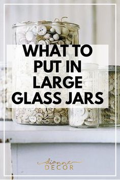 jars filled with buttons and glass jars on top of a white shelf next to the words, what to put in large glass jars