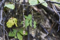 These earrings are: - made from pure Eco-friendly bronze (88% copper and 12% tin); - with sterling silver ear wires; - handcrafted. A family of three runs this shop - me, my mother and my step-father. We are kind, open-minded and experienced Latvian jewelry artists. We are not commercial and never will be. We stay unique and weird. We make our art and we're happy that we can share with it! For more cool jewelry designs click here: https://www.etsy.com/shop/WitchJewelryShop Like our shop? Follow Silver Copper Wrap Earrings Gift, Handmade Bronze Long Drop Jewelry, Nature-inspired Copper Dangle Earrings, Nature-inspired Bronze Drop Earrings, Nature-inspired Bronze Earrings For Gifts, Handmade Metal Earrings Nature-inspired, Silver Wire Wrapped Nature-inspired Earrings, Handmade Metal Earrings With Nature-inspired Style, Nature-inspired Silver Wire Wrapped Earrings