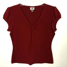 Worthington Deep Red Stretchy V-Neck Top. Size Pm. Pretty Gathering At Base Of V-Neck And Puffed Cap Sleeves. Excellent Condition (Never Worn). Polyester/Spandex Blend. Approximate Measurements: Armpit To Armpit 19" Shoulder To Hem 22" Bundle And Save! Bundle With Three Other Items With “3/$15” At The Beginning Of Listing And Send Me An Offer For $15 And I Will Accept! Classic V-neck Fitted Top, Classic Fitted V-neck Top, Classic Stretch Red Tops, Classic Red Stretch Tops, Red V-neck Top, Red Fitted V-neck Top, Elegant Red V-neck Tops, Red V-neck Casual T-shirt, Red V-neck Blouse Relaxed Fit