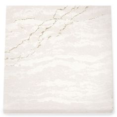 a white marble tile with an abstract design on it's surface, in the shape of a rectangle