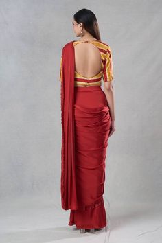 Rust pre-drape saree featuring dangling pipe and bead detailing on the hem. Paired with stripe pattern padded blouse. - Aza Fashions Jayanti Reddy, Rohit Bal, Padded Blouse, Drape Saree, Tarun Tahiliani, Luxury Sale, Orange Blouse, Satin Color, Elbow Sleeve